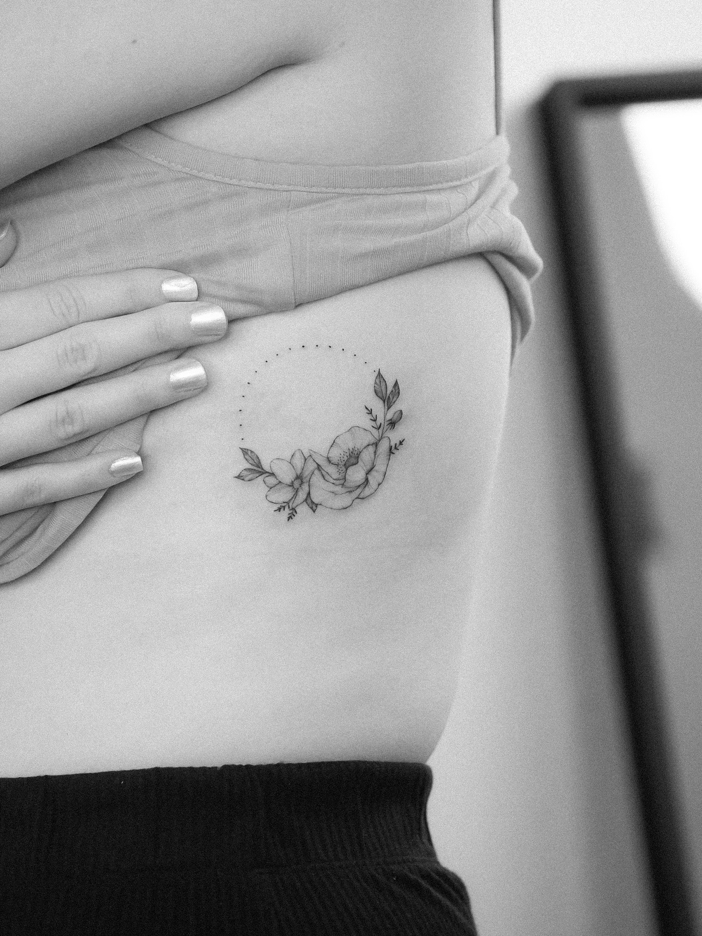 Poppy circle fineline tattoo