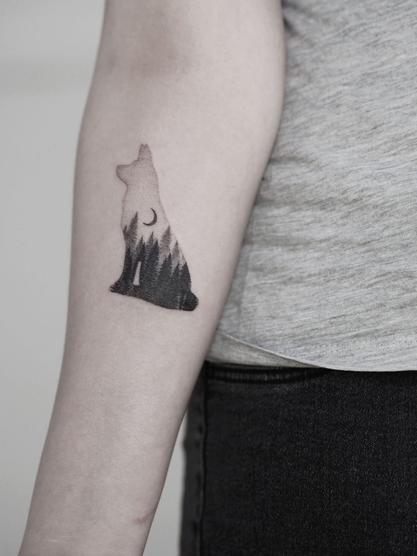 Wolf and forest silhouette tattoo by Alina BUNAMI INK