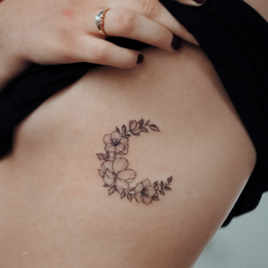 Wildrose cherry blossom-moon ribtattoo by Alina BUNAMI INK